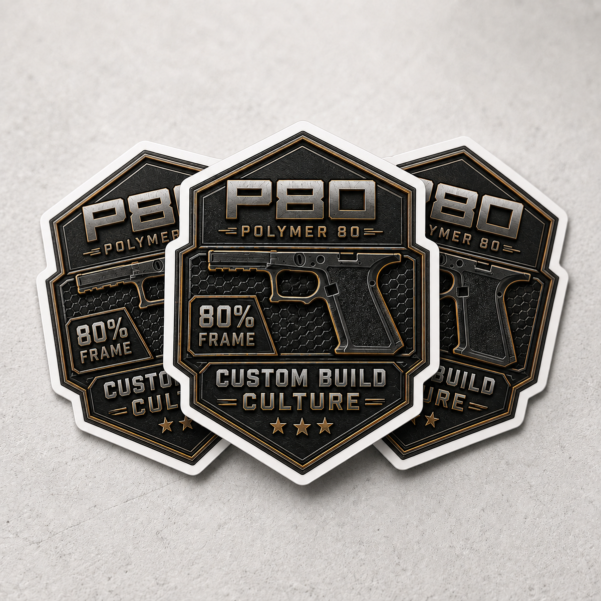 Three overlapping custom Polymer 80 sticker decals with a black and gold design featuring a pistol graphic